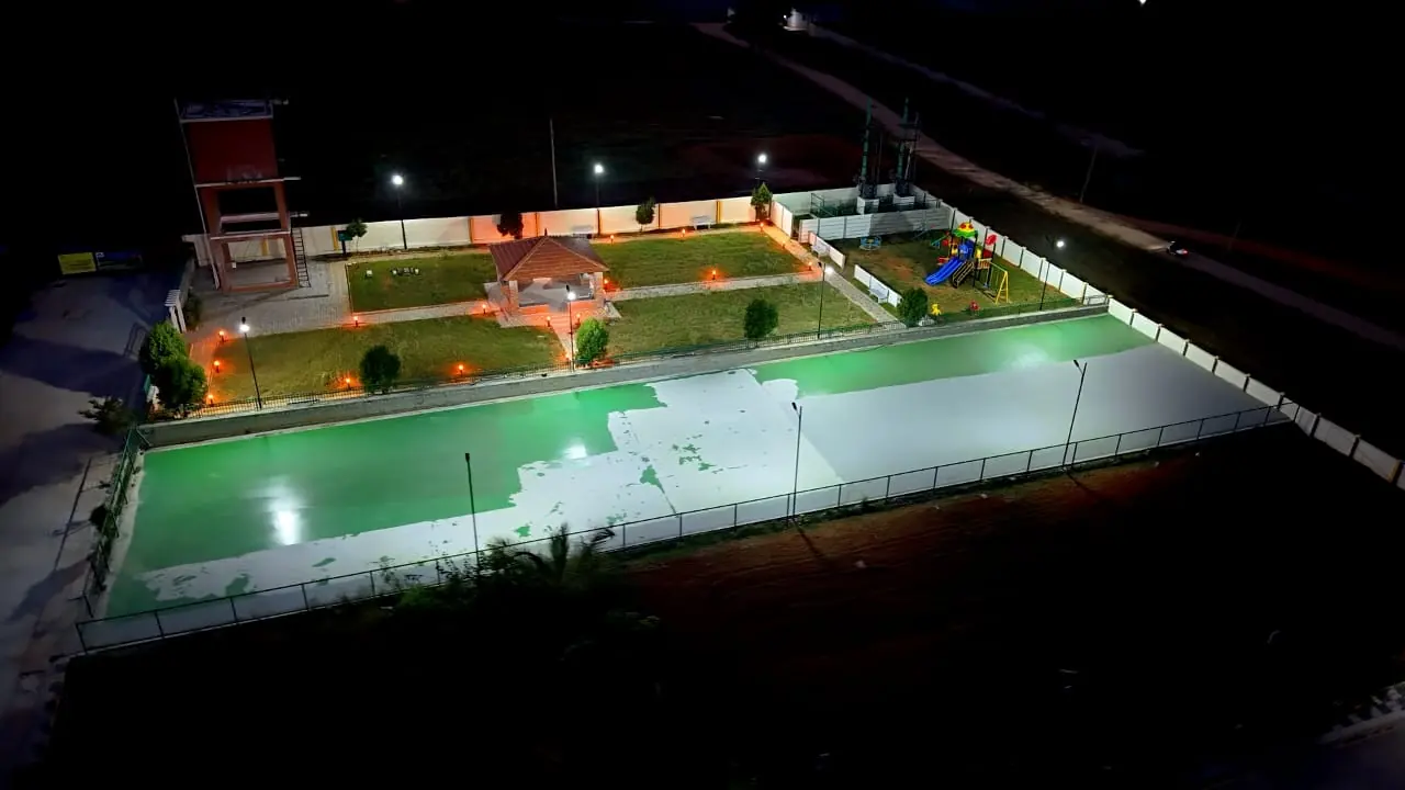 Night aerial view of the lit sports court